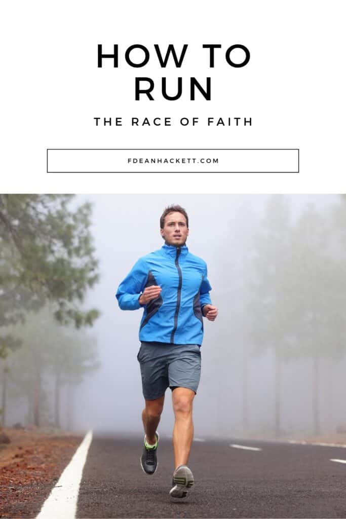 Man in blue jacket and shorts running on a foggy morning