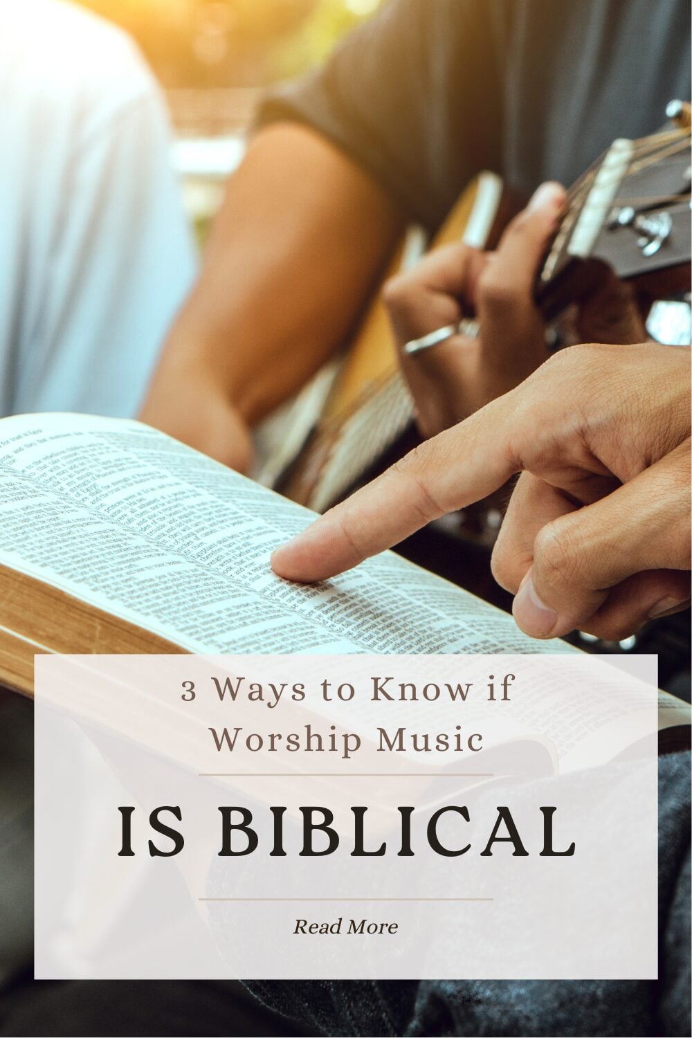 One person playing guitar, a second person following along in a songbook, finding ways to know if worship music is biblical