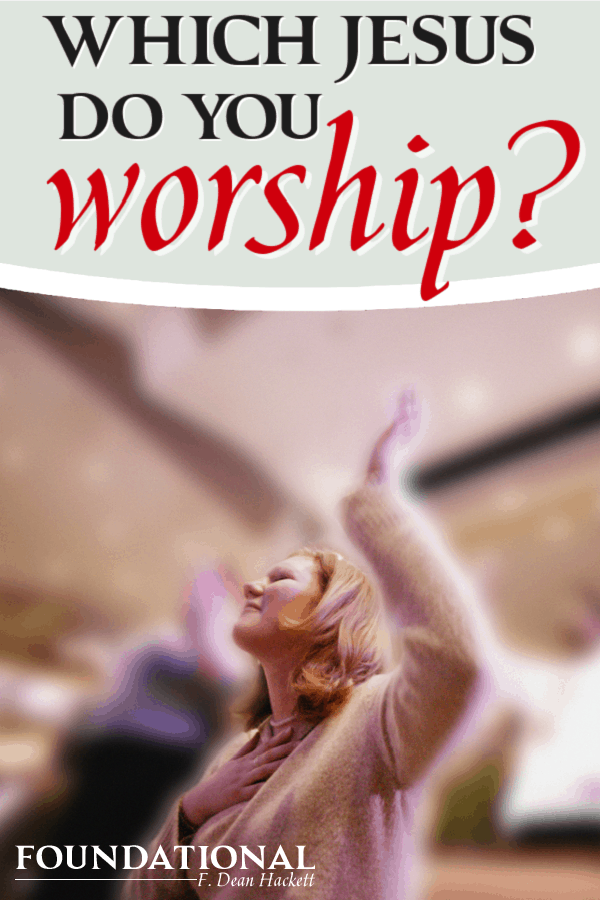 woman raising hand worshiping in Church