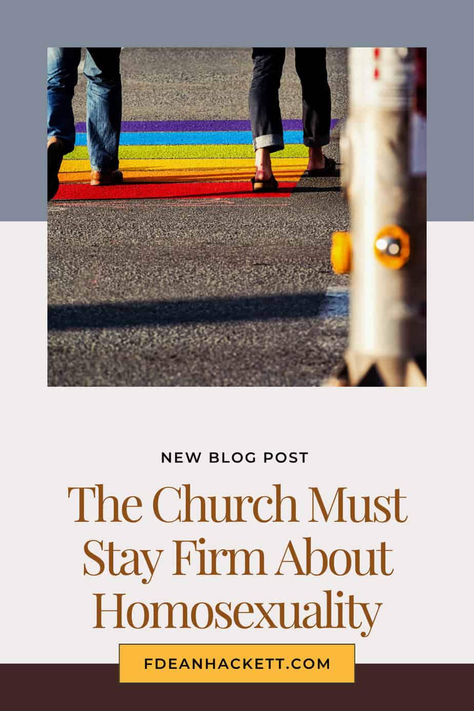 Two people walking across rainbow painted on the road