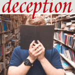 Person standing in library holding book over face