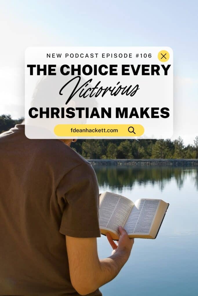 Man sitting by lake reading a Bible