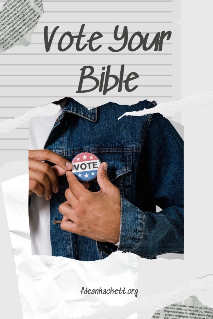 Man sticking "I voted" button on denim jacket