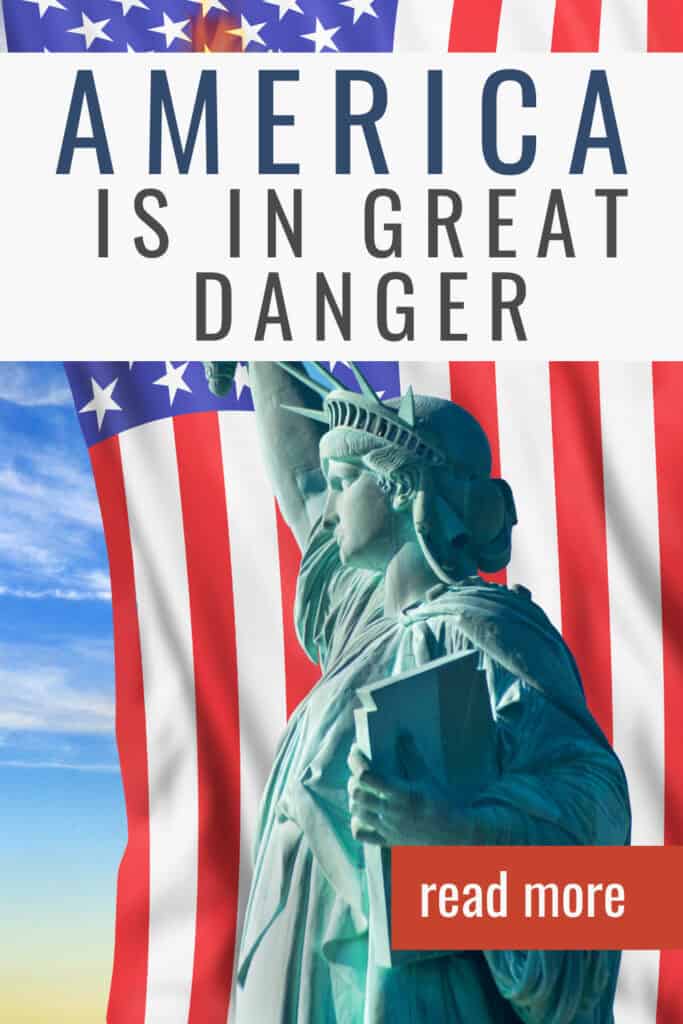 The Statue of Liberty set against an American flag
