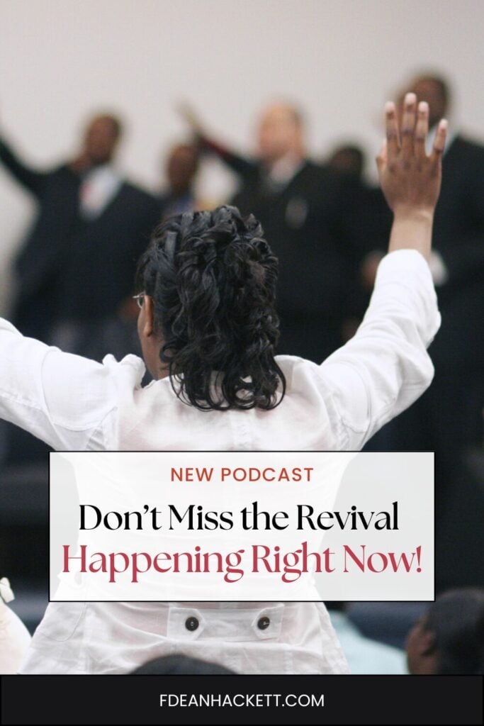 People in church raising their hands