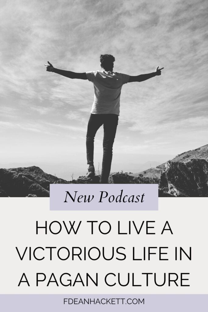 Man with arms outstretched learning how to live a victorious life in a pagan culture
