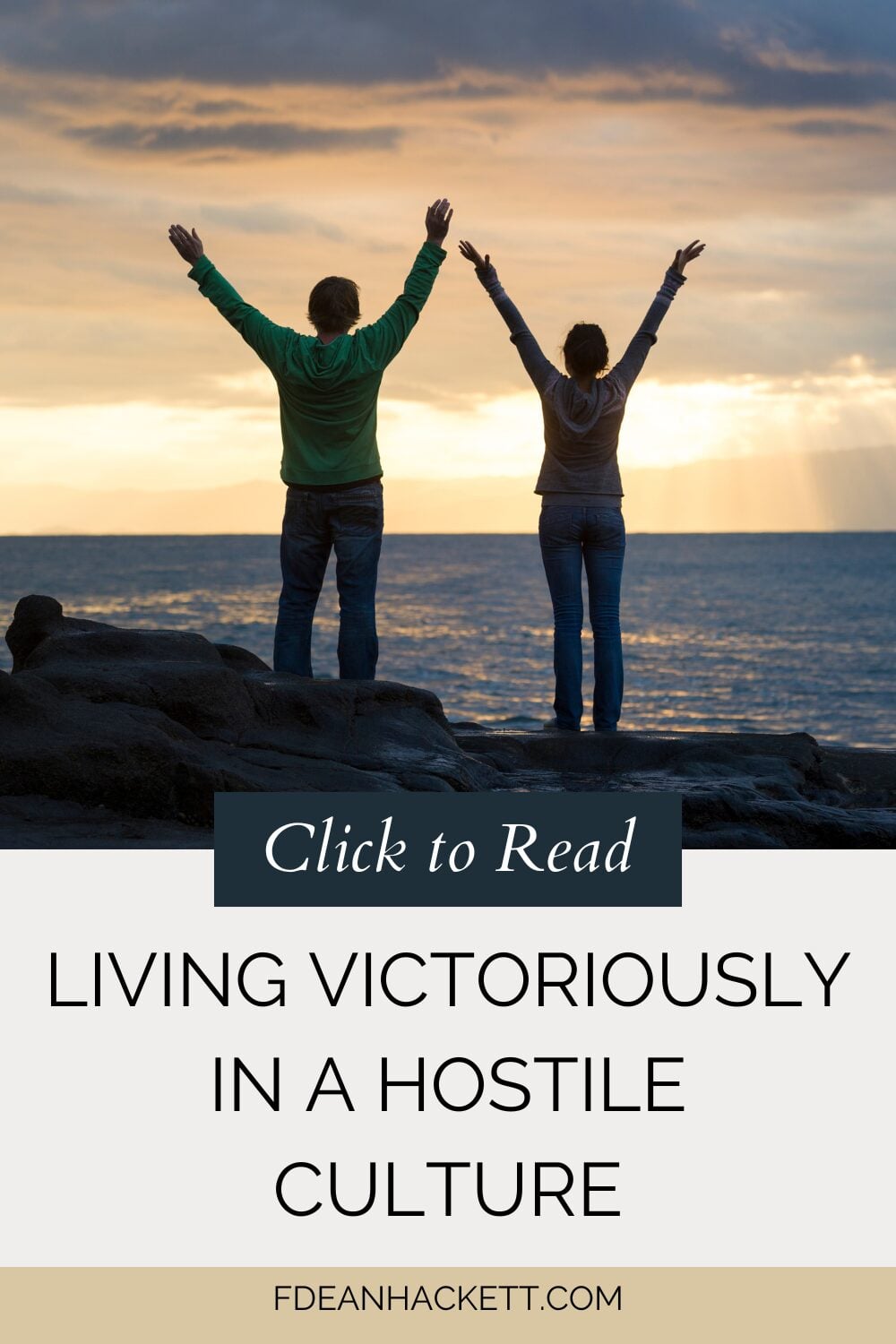 Two people on mountaintop living victoriously
